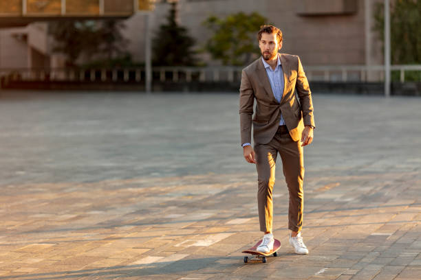istock Businessman on a Skateboard 1180191769