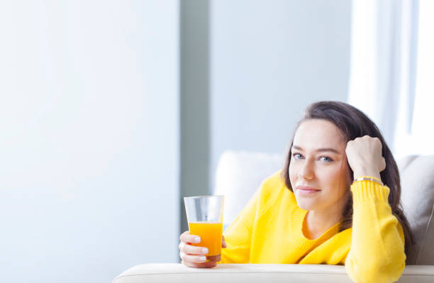 480+ On Couch Drinking Orange Juice Stock Photos, Pictures & Royalty ...