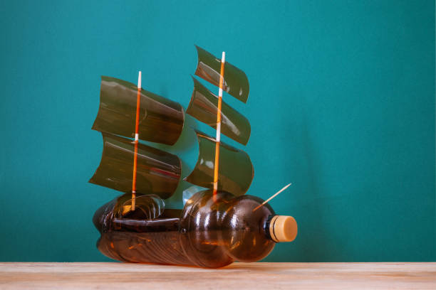 Toy ship made of a plastic bottle. Recycle crafts. stock photo