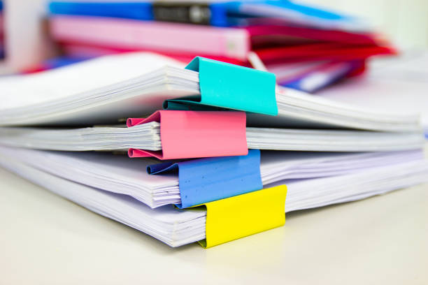 file folder and stack of business report paper file on the table in a work office - pile of newspapers audio imagens e fotografias de stock