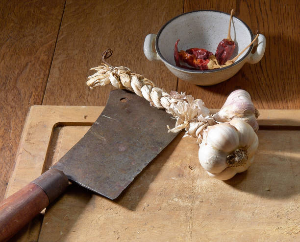istock Butcher knife or axe, garlic and red peppers 1180199919