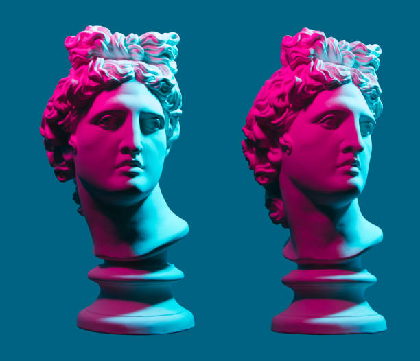 Statue neon. On a blue isolated background. Gypsum statue of Apollo's head. Man. Statue neon. On a blue isolated background. Gypsum statue of Apollo's head. Man. bust sculpture photos stock pictures, royalty-free photos & images