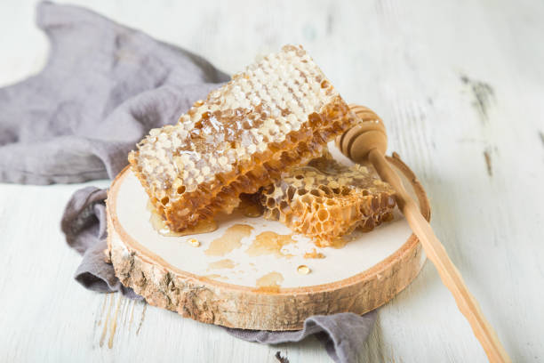 istock Bee honeycombs, honey in bee honeycombs 1180201365