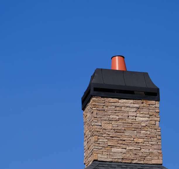 istock Stone Chimeny with Metal Cap 1180201794