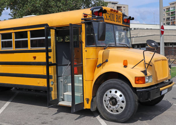 istock School bus at the parking lot 1180203839