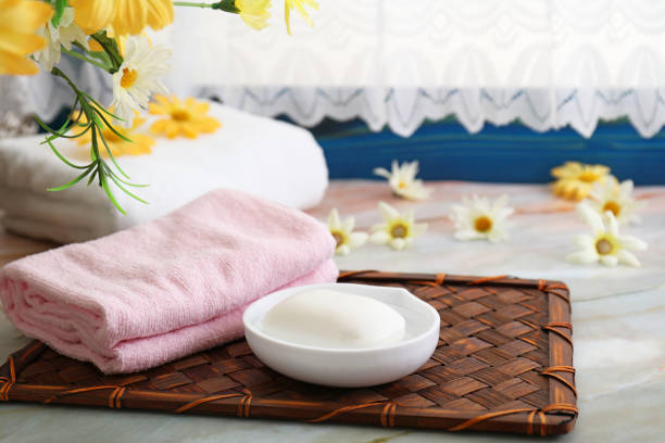Cotton towels and soap on the table