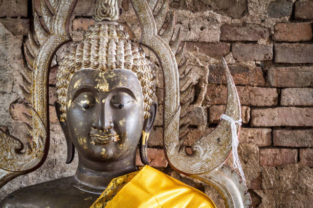 istock Visakha Puja Day, Buddha statue meditate is on base. 1180204278