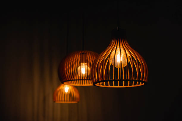 Chandeliers with yellow illumination. Interior design.