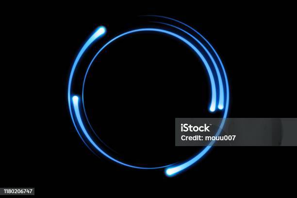 Blue Fire Comet Light Flying In Circle Shining Lights In Motion With Particles On Black Sky Ring Of Fire Abstract Background Stock Photo - Download Image Now