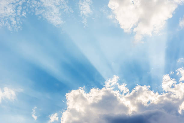 istock good view to clouds in blue sky with rays 1180207245