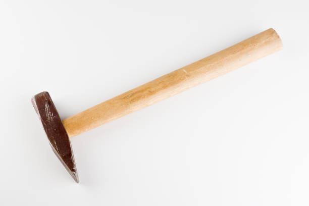Small hammer with wooden handle isolated on a white background
