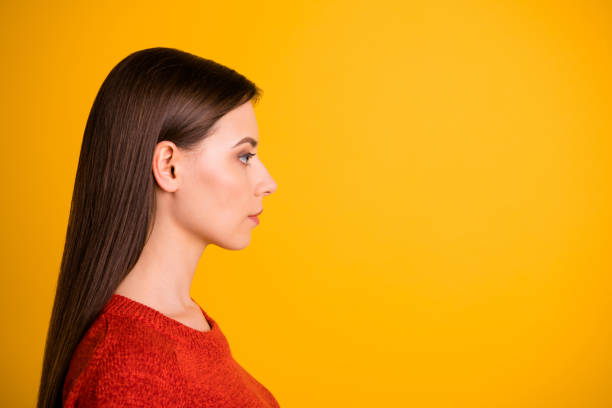 istock Photo of puzzled creative serious manager staring into empty space thoughtfully with confident strict facial expression isolated over vivid color background 1180209778