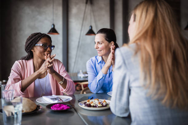 Female businesswoman on a meeting in a restaurant Female businesswoman on a meeting in a restaurant business lunch stock pictures, royalty-free photos & images