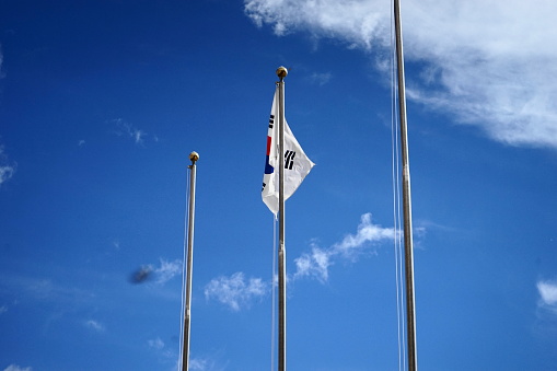 Korean flag waving in the blue sky