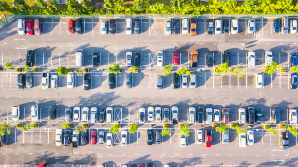 istock Aerial view  Parking lot and car 1180214532