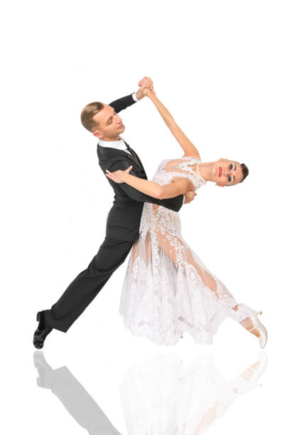 istock ballrom dance couple in a dance pose isolated on white bachground 1180215464