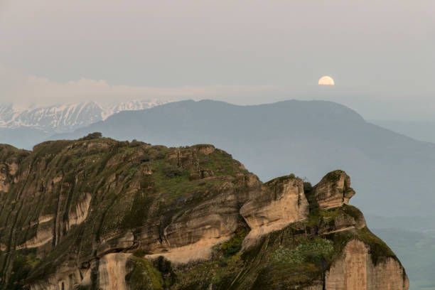 istock Moonset in the horizon at Meteora 1180216717