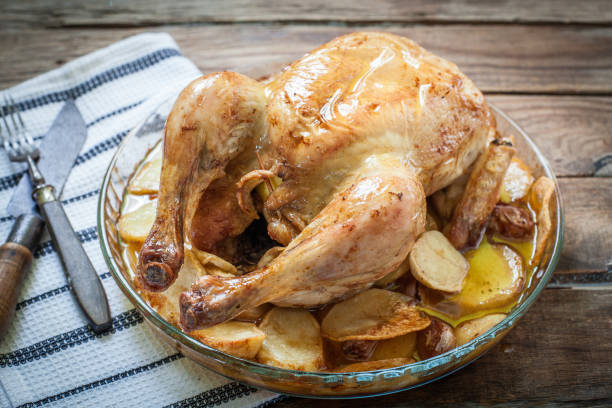 istock Homemade chicken roasted with potato 1180216778