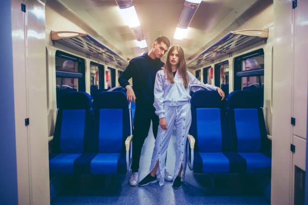 istock Young couple in a train vehicle 1180217034