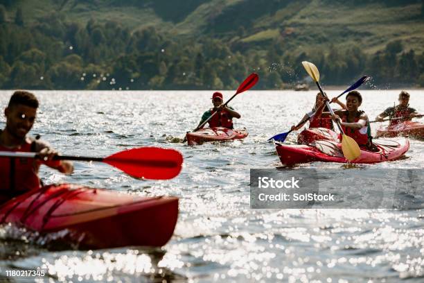 Group Of Friends Kayaking Stock Photo - Download Image Now - Kayaking, Kayak, Outdoor Pursuit