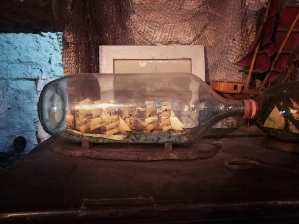 istock vintage sailing boat in a glass bottle 1180217660