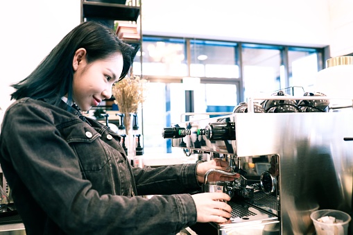 Asian barista at the coffee shop