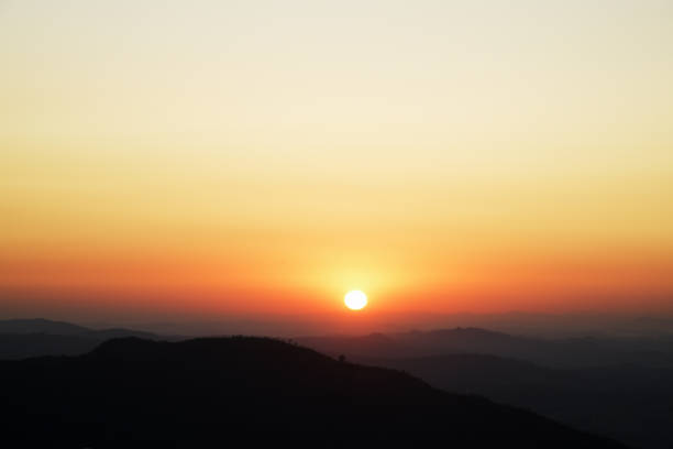 Sunrise with orange horizon in the Brazilian mountains.