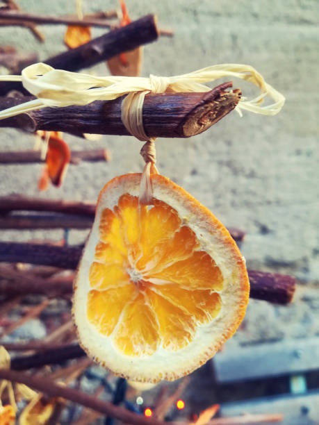 Dried Orange Slices Christmas Decoration with cinnamon, xmas tree detail