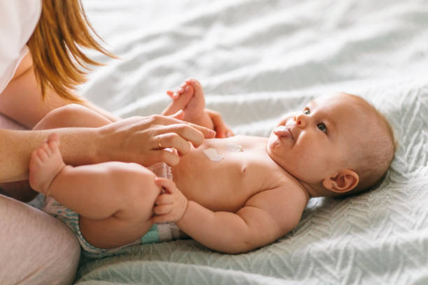 istock Baby skin care with cream 1180226486
