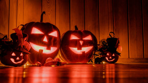 istock Halloween pumpkin head jack lantern over shining background 1180227670