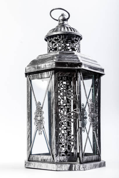istock Beautiful vintage metal lantern on a white background 1180234447