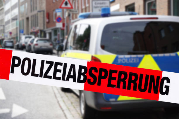 istock German police car with cordon tape 1180240890