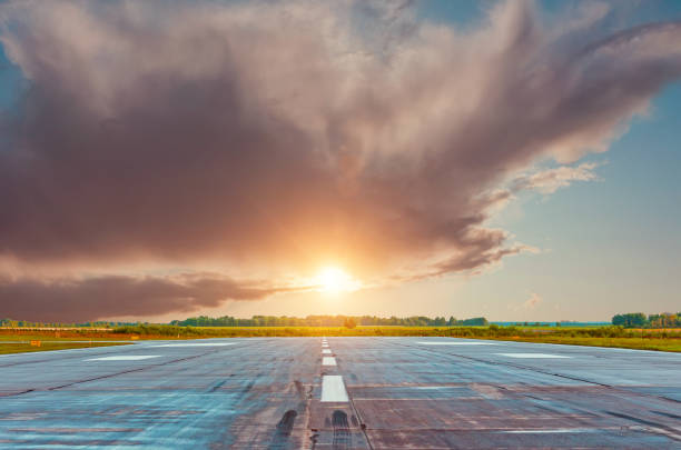 istock Empty lane in the morning at dawn at the airport. 1180243407