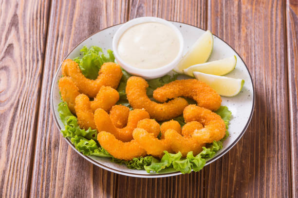 istock Shrimps in batter with sauce and lime 1180247914