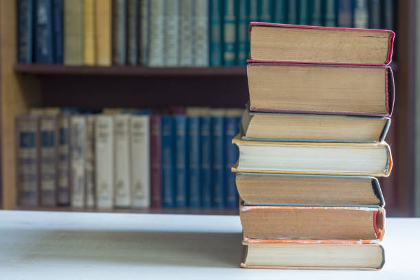 istock Collection of old books in library 1180248041