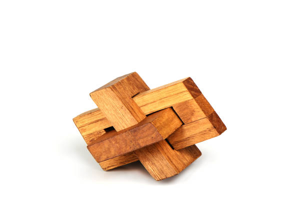 istock Wooden constructor puzzle oblique knot over white background. 1180249754