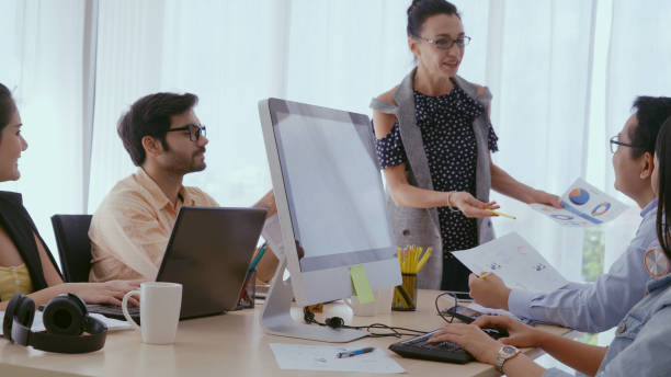 istock Senior leader giving advice speech to team members 1180251423