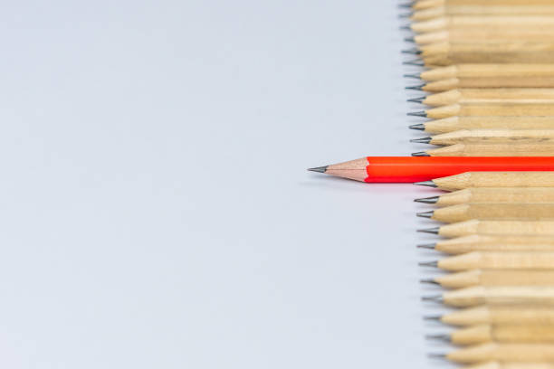 istock Different pencil standout show leadership concept. 1180251484
