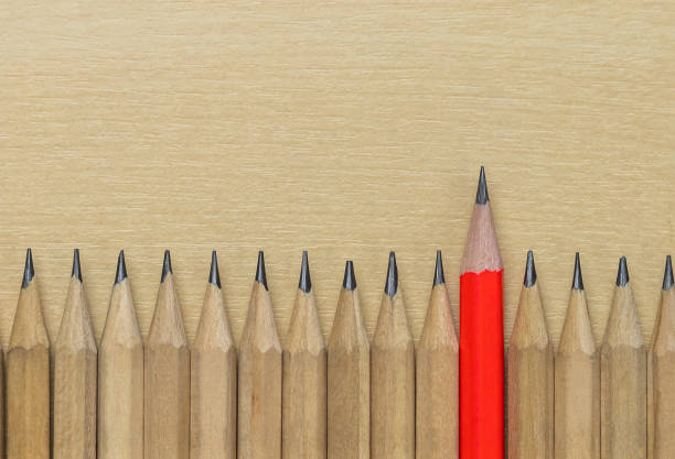 istock Different pencil standout show leadership concept. 1180251500