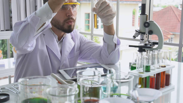 istock Scientist work with science equipment in laboratory. Scientific research concept. 1180251656