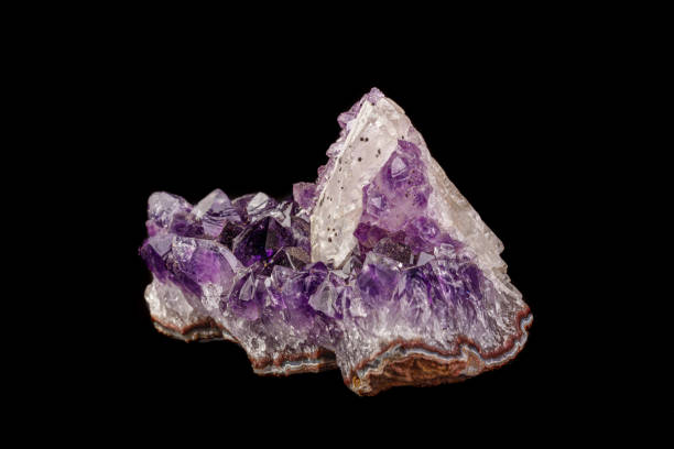 istock macro mineral amethyst stone with calcite black background 1180252296