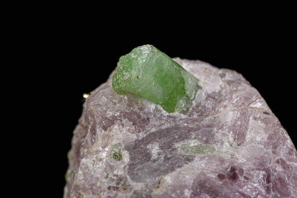 istock macro mineral stone pargasite on black background 1180253255