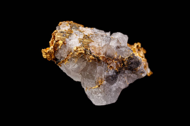 istock macro mineral stone gold in the rock on a black background 1180254510