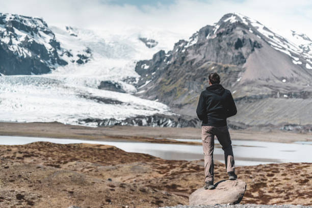 istock Man and Icelandic landscape 1180255728