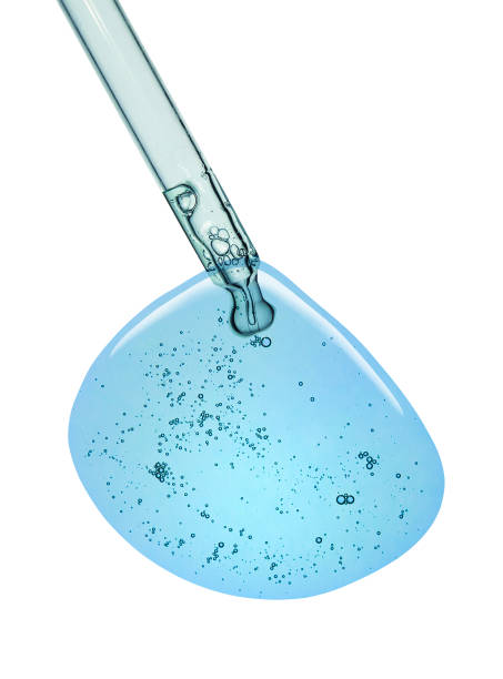 istock Liquid serum gel on a table screen of microscope isolated background 1180256130