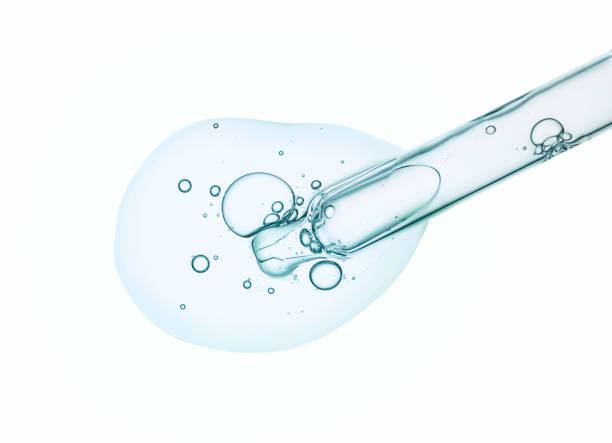 istock Liquid serum gel on a table screen of microscope isolated background 1180256223