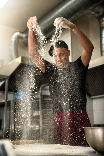 istock Chef preparing a pizza stock photo 1180256244