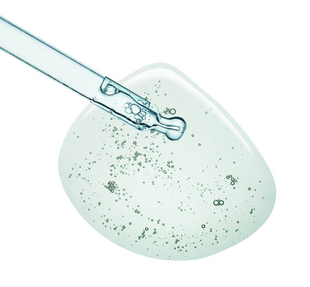 istock Liquid serum gel on a table screen of microscope isolated background 1180257107
