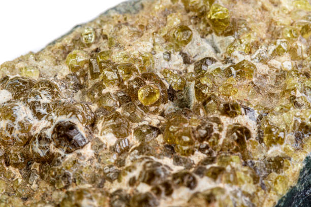 istock macro mineral stone grossular on a white background 1180257750