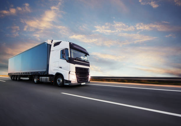 istock European truck vehicle with dramatic sunset light 1180257847